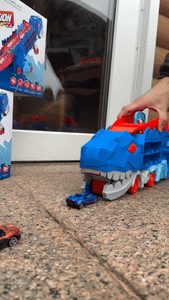 Dinosaur Truck with Foldable Sliding Race Track